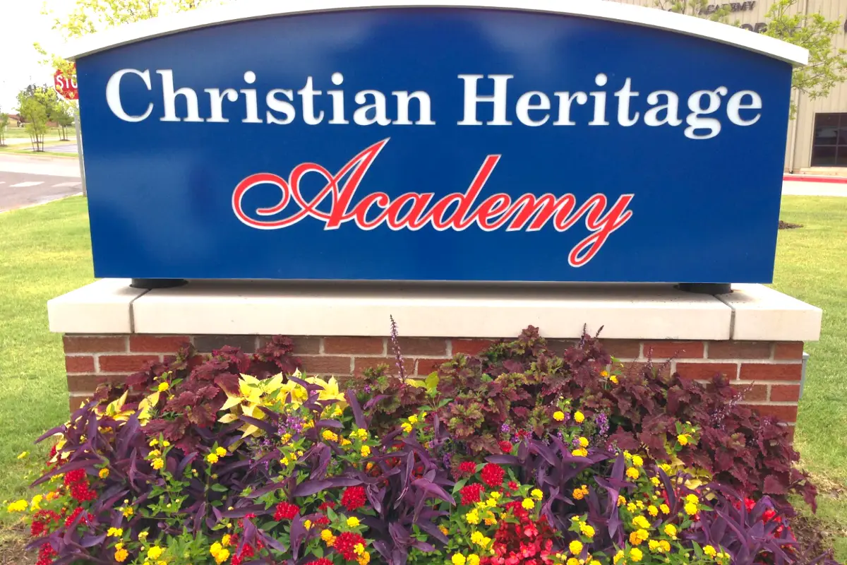 Christian Heritage Academy sign with flower plantings Christian Heritage Academy sign with flower plantings